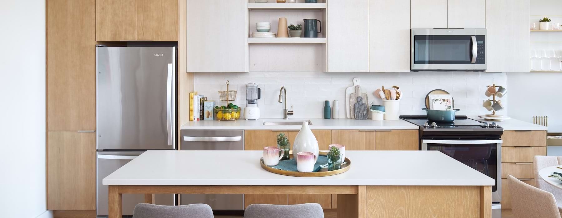 a kitchen with white cabinets